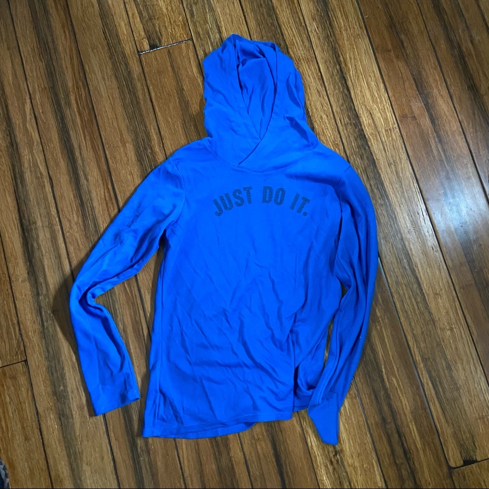 Blue Nike knit running top. Size Small.